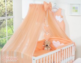 Duża moskitiera do łóżeczka dziecięcego z szyfonu z wiszącymi serduszkami i kokardką - brzoskwiniowa